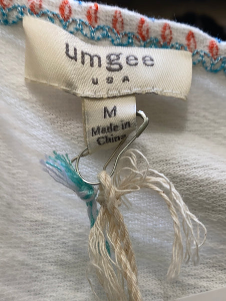 Umgee NWT Size M (runs large)